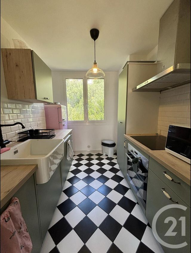 Appartement T2 à louer - 3 pièces - 67.0 m2 - BASTIA - 202 - CORSE - Century 21 Jade Immobilier