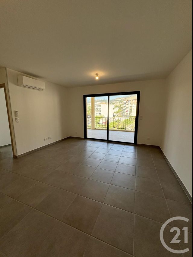 Appartement T3 à louer - 3 pièces - 64.15 m2 - BASTIA - 202 - CORSE - Century 21 Jade Immobilier