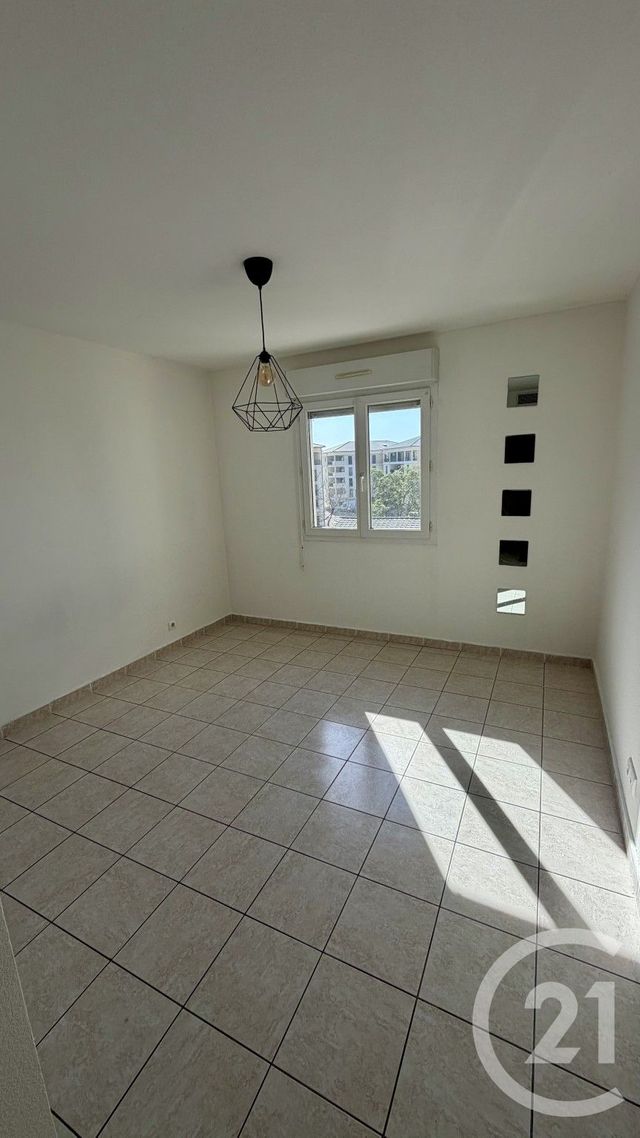 Appartement T2 à louer - 2 pièces - 50.0 m2 - BASTIA - 202 - CORSE - Century 21 Jade Immobilier
